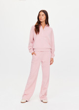 THE UPSIDE women's pink organic cotton french terry McGrath Collared Elle Polo is a relaxed, long sleeve polo with a collar and front buttons. Made for lifestyle.