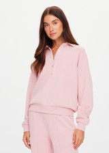 THE UPSIDE women's pink organic cotton french terry McGrath Collared Elle Polo is a relaxed, long sleeve polo with a collar and front buttons. Made for lifestyle.