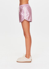 THE UPSIDE women's pink Mcgrath Billie Run Short is a mid-rise lightweight short in a metallic pink fabrication and features and side pockets and an elasticated waistband with drawcord. Made for lifestyle.
