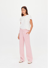 THE UPSIDE women's pink organic cotton french terry McGrath Willow Wide Leg Pant is a high-rise wide leg fit with side pockets and an elasticated waistband with a drawcord. Made for everyday wear.