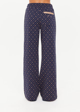 THE UPSIDE women's monogram jacquard Ezra Nova Flare Pant features a monogram geometric design and an elasticated waistband with drawcord. Made for lifestyle.