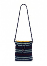 THE UPSIDE women’s stripe organic cotton Cabana Crochet Mini Bag is crossbody and handmade with a navy paracord strap and cord with toggle. Made for lifestyle.