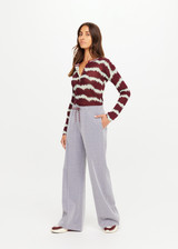 THE UPSIDE women’s sparkle grey Galaxia Marnie Wide Leg Pant is high rise with side pockets, an elasticated waistband and a maroon drawcord. Made for lifestyle.