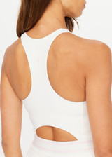 THE UPSIDE women’s cream recycled Kova Racerback Dress has built in shorts with pockets, a scooped front neckline with a racerback bra. Made for tennis.