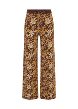 THE UPSIDE women's floral organic cotton Copacabana Juniper Knit Pant offers a soft and supportive fit with a straight leg silhouette, side stripes and drawcord waistband. Made for lifestyle.