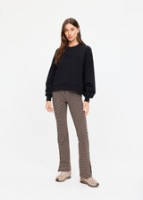 THE UPSIDE women's black organic cotton Paloma Crew is designed for an oversized fit and features dropped shoulders, ribbed trims and rhinestone logo detailing. Made for lifestyle.