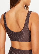 THE UPSIDE women's geo recycled supersoft Poet Harley Scoop Sports Bra offers a soft and supportive fit with scoop necklines, removable cups and a signature geo print. Made for yoga and pilates.