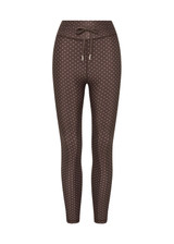 THE UPSIDE women's geo recycled supersoft Poet 25inch Midi Legging features a soft and supportive fit, mid rise waist, adjustable drawcord and signature geo print. Made for yoga and pilates.