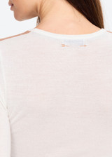 THE UPSIDE women's natural Merino Wool Long Sleeve Top is designed for a slim fit and features a crew neckline, contrast sleeve stripe and soft fine knit feel. Made for lifestyle.