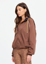 THE UPSIDE women’s brown recycled fabric Lila Zip Through Jacket is designed for a regular fit and features contrast piping, front pockets and a drawcord hem. Made for running.