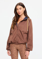 THE UPSIDE women’s brown recycled fabric Lila Zip Through Jacket is designed for a regular fit and features contrast piping, front pockets and a drawcord hem. Made for running.