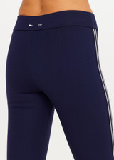 THE UPSIDE women’s navy sustainable Joyela Panelled Flare Pant is mid rise and features an internal elasticated waistband, front and back darts and contrast side stripe tape. Made for lifestyle.