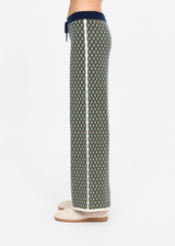 THE UPSIDE women's Viva Juniper Knit Pant is a soft and supportive fit and features a straight leg silhouette, geo jacquard knit design and contrast side stripe detailing. Made for lifestyle.