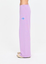 THE UPSIDE women's violet organic cotton Soul Cal Wide Leg Track Pant is designed for a relaxed fit, featuring a mid rise waist and wide leg silhouette. Made for lifestyle.