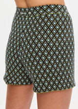 THE UPSIDE women's cream organic cotton blend Viva Jaya Knit Short features a mid rise fit and jacquard geo detailing with an embroidered arrow logo. Made for lifestyle.