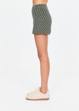 THE UPSIDE women's cream organic cotton blend Viva Jaya Knit Short features a mid rise fit and jacquard geo detailing with an embroidered arrow logo. Made for lifestyle.