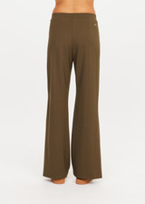 THE UPSIDE women's green Petra Flare Pant combines a true-to-size mid rise fit with side seam pockets, striped side tape and hem splits. Made for lifestyle.