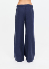 THE UPSIDE women's navy Lago Elita Pant is designed for a true-to-size mid rise fit and features a wide leg silhouette, side pockets and an adjustable drawcord waist. Made for lifestyle.