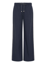 THE UPSIDE women's navy Lago Elita Pant is designed for a true-to-size mid rise fit and features a wide leg silhouette, side pockets and an adjustable drawcord waist. Made for lifestyle.