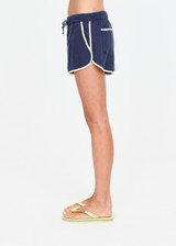 THE UPSIDE women's navy Lago Marlin Short crafted for a true-to-size low rise fit with side and back pockets, contrast binding and an adjustable drawcord waist. Made for lifestyle.