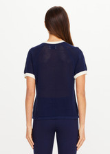 THE UPSIDE women’s navy 100% organic cotton Fenway Jordan Knit Tee offers a relaxed fit and features an open knit construction, contrast sleeve stripe detailing and ribbed trims. Made for lifestyle.