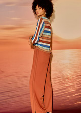 THE UPSIDE women's stripe Iza Milla Long Sleeve Knit Top is designed for a relaxed fit and features a semi sheer lightweight knit and multicolour stripe detailing. Made for lifestyle.