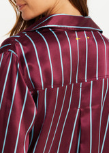 THE UPSIDE women’s stripe 100% silk Capela Billy Silk Shirt is a relaxed fit long sleeve button up and features a collar, button cuffs and stripe satin finish. Made for lifestyle.