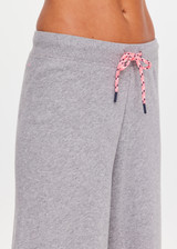 THE UPSIDE women's grey organic cotton Sandy Wide Leg Track Pant is cut in a relaxed shape with an elasticated waistband and pink paracord drawcord. The perfect everyday track pant, made to last.