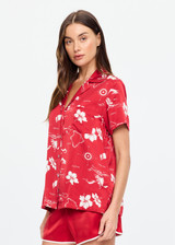 THE UPSIDE women's red  Dusty's Holiday Shirt is a short sleeve button-up in our holiday red and cream printed design and features a patch pocket on front chest. Made for lifestyle.