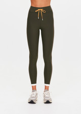THE UPSIDE women's olive Laguna 25inch Legging offers soft support and features an orange drawcord and contrast cuffs at hem. Made for yoga & pilates.