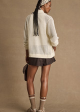 THE UPSIDE women's cream Hunter Knitted Jacket is designed for a relaxed fit and features an open knit construction and zipper opening. Made for lifestyle.