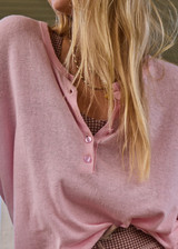 THE UPSIDE women's pink Rylee Knit Button Top is crafted from a lightweight organic cotton linen fabrication and features dropped shoulders and pink pearlised buttons. Made for lifestyle.