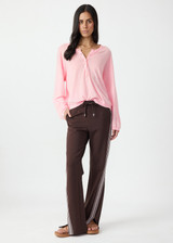 THE UPSIDE women's pink Rylee Knit Button Top is crafted from a lightweight organic cotton linen fabrication and features dropped shoulders and pink pearlised buttons. Made for lifestyle.