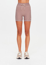 THE UPSIDE women's check Palacio 5inch Pocket Spin Short is mid-rise with no front seam and mushroom drawcord with aglets. Made for yoga and pilates.