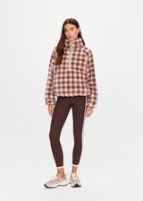 THE UPSIDE women's check recycled Palacio Harlow Fleece Pullover is relaxed fit with quarter-zip woven binds and zip pockets. Made for lifestyle.