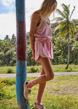 THE UPSIDE women’s pink Cortina Klio Short is a relaxed-fit style with a soft elasticated waistband and pink paracord drawcord with cream aglet ends. Made for lifestyle.