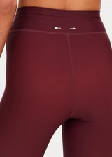 THE UPSIDE women's red Maya 25 Inch Legging is a mid-rise fit and features an elasticated drawcord in light blue with aglets. Made for yoga and pilates.