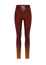 THE UPSIDE women's red Maya 25 Inch Legging is a mid-rise fit and features an elasticated drawcord in light blue with aglets. Made for yoga and pilates.