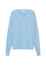 THE UPSIDE women's blue organic cotton Lou V Neck Sweater is an oversized fit and features dropped shoulders and a ribbed neckline and cuffs. Made for lifestyle.