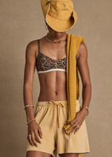 THE UPSIDE women's washed yellow cotton Billy Jean Wide Brim Hat is classic cowboy hat with optional upturned brim with snap buttons and an adjustable inner brim with ribbon.