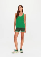 THE UPSIDE women's green organic cotton La Paz Riva Knit Tank is a basketball tank style featuring an open knit construction and a knitted palm tree detail on back. Made for lifestyle.