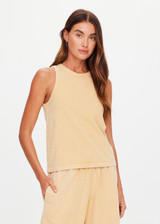 THE UPSIDE women's yellow Soho Hunter Tank Top features a high neckline and is crafted from our soft brushed recycled cotton fabrication. Made for everyday leisure.