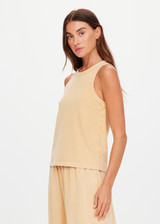 THE UPSIDE women's yellow Soho Hunter Tank Top features a high neckline and is crafted from our soft brushed recycled cotton fabrication. Made for everyday leisure.