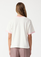 THE UPSIDE women's pink organic cotton Jacob Tee is an oversized fit and features contrast pink binds on sleeves and a small embroidered logo on front chest. Made for lifestyle.