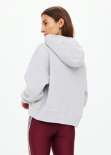 THE UPSIDE women's grey marle Byron Embossed Logo Hoodie is made from an organic cotton with a relaxed boxy shape featuring a tonal embossed horseshoe logo at the front.