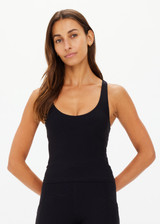 THE UPSIDE women's black recycled peached Laurie Tank Top provides mid coverage longline tank top with a scooped T bar back and internal underbust elastic and removable cups. The fabric is breathable and moisture wicking.