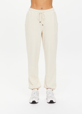 THE UPSIDE women's white organic cotton Hamilton Aries Track Pant is designed for a regular fit and features elasticated waistband and side seam pockets. Perfect for everyday.