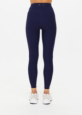THE UPSIDE women's navy recycled peached Daytona 25 inch Legging is designed for a high-rise supportive fit and features contrast cream binds. Perfect for yoga.