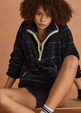 THE UPSIDE women's blue stripe Harlow Fleece Pullover is designed for a relaxed fit and features zip pockets and elasticated waist and cuffs. Made for lifestyle.