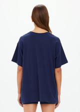 THE UPSIDE women's navy organic cotton Stardust Sammi Tee is designed for an oversized fit and features printed puff logo at front. Made for lifestyle.